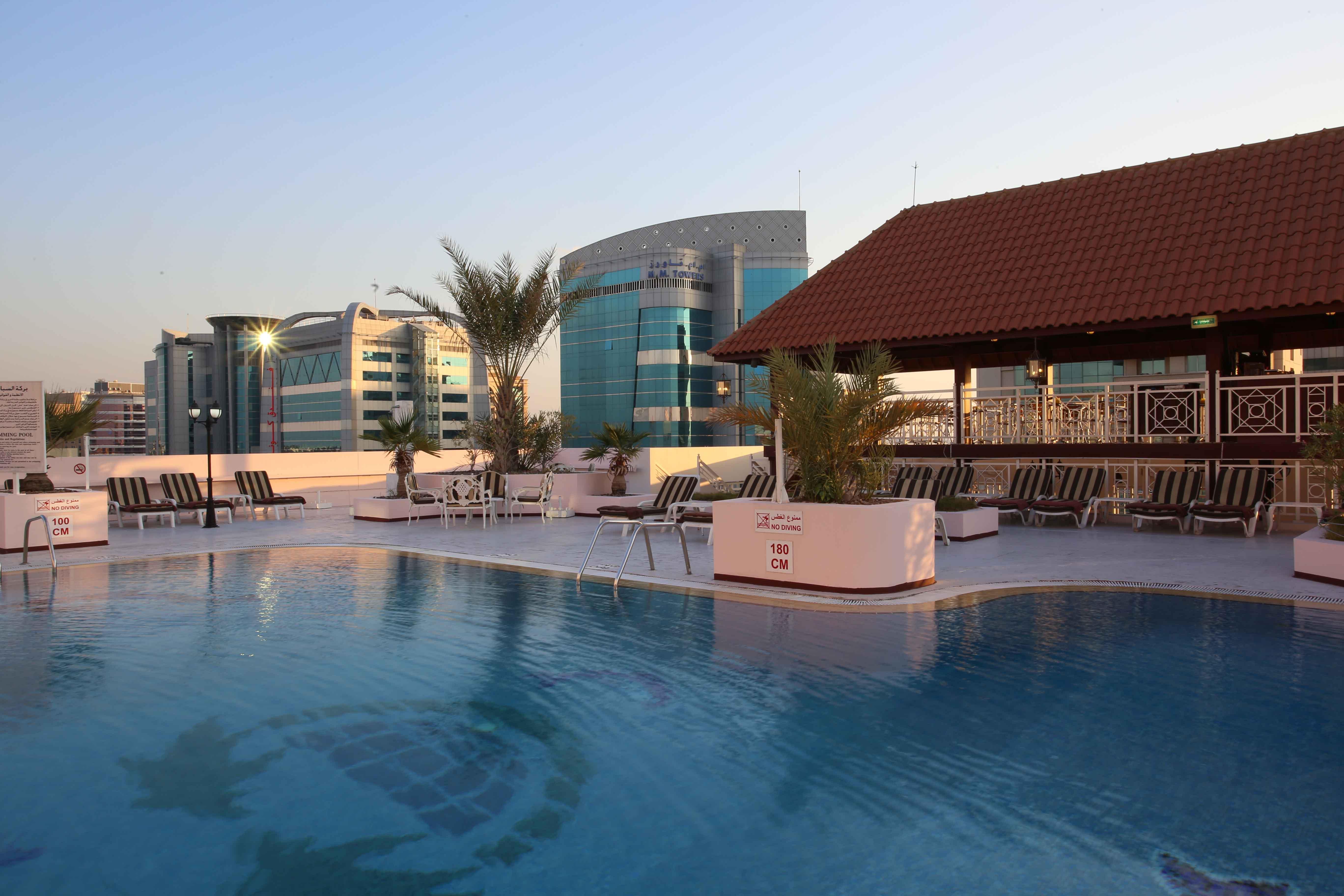 Knight Castle Hotel Dubai Exterior photo Rooftop pool at the hotel