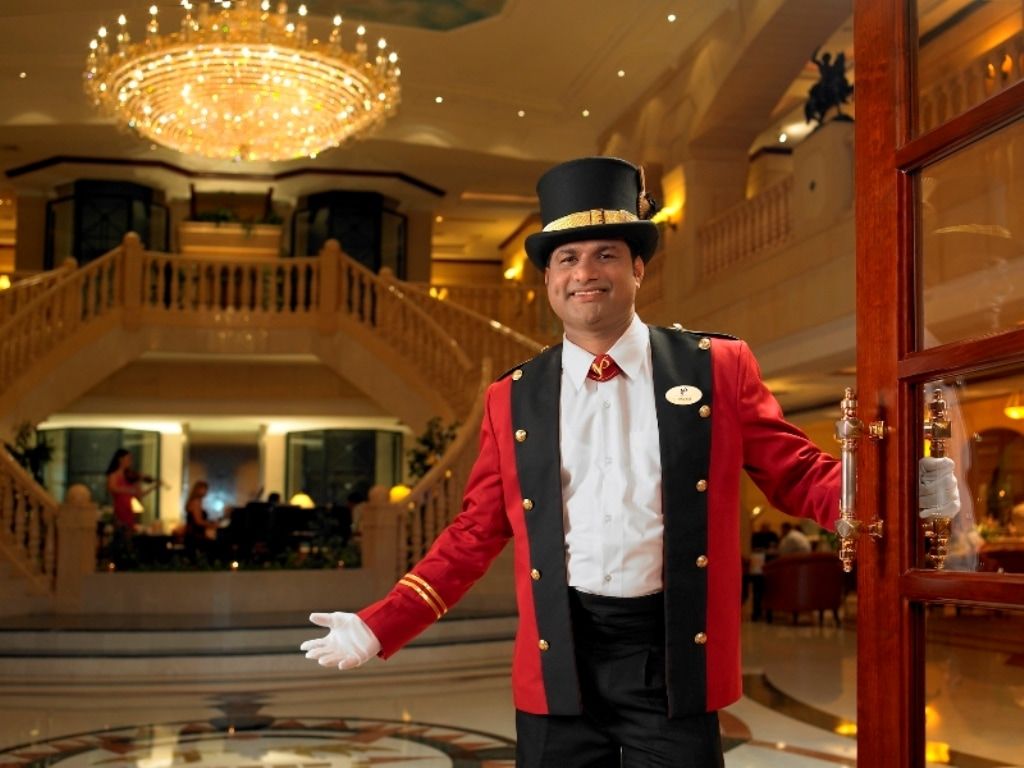 Knight Castle Hotel Dubai Exterior photo A doorman at the Grand Hyatt Hotel, Mumbai, India